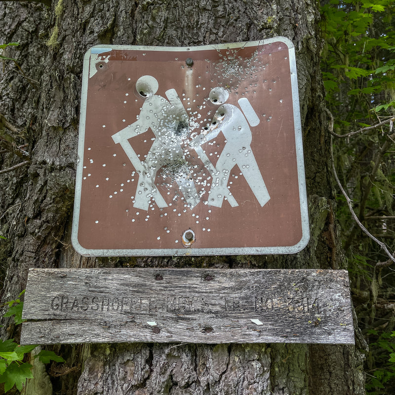 Grasshopper Meadows Trailhead sign