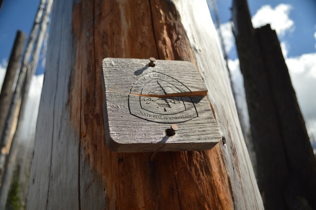 Wooden Pacific Crest Trail marker