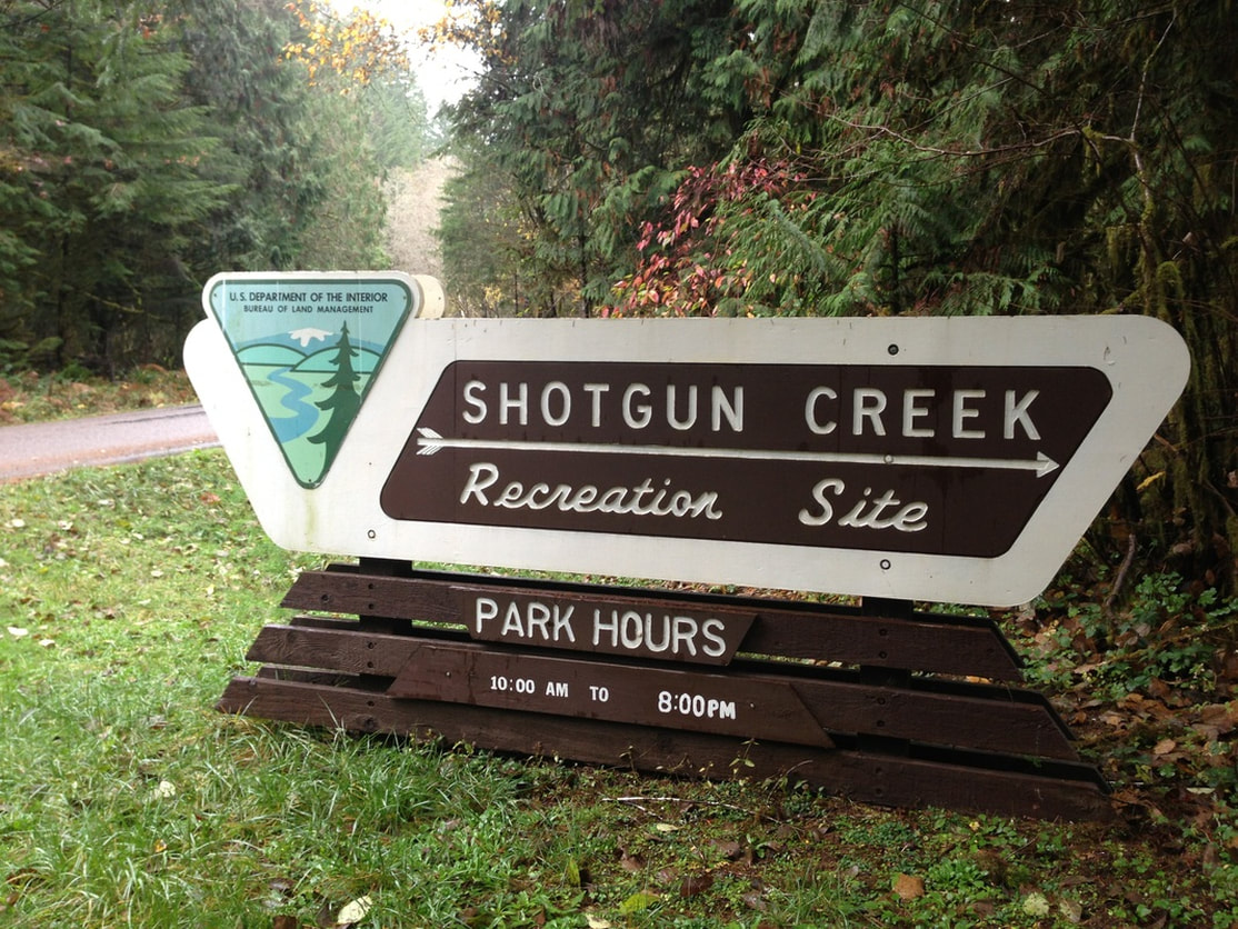 The Shotgun Creek Recreation sign, park hours 10am to 8pm